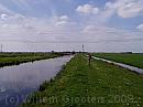 20-NaarDeBrug * Cpoming from there, heading for the nearest bridge, following this dyke, to return on the other side (and get to Ouderkerk just before the power lines) * 1984 x 1488 * (274KB)