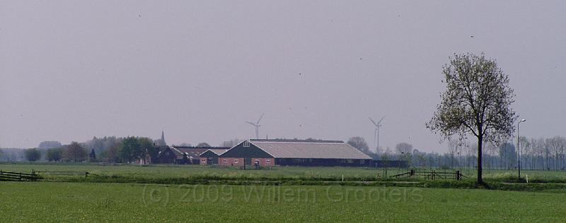 07-Molens.jpg - Power mills in the distance - behind a typical Dutch polder landscape.