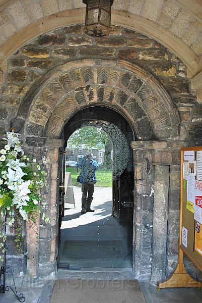 24-Entrance.jpg - The outside entrance, with a decorated glass door. The stones may well me Roman in origin: Hadrian's wall is quite near...