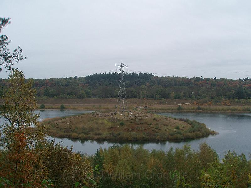 13-Island.jpg - In the former sandpit, there is an iland on which stands a pole of the power grid.