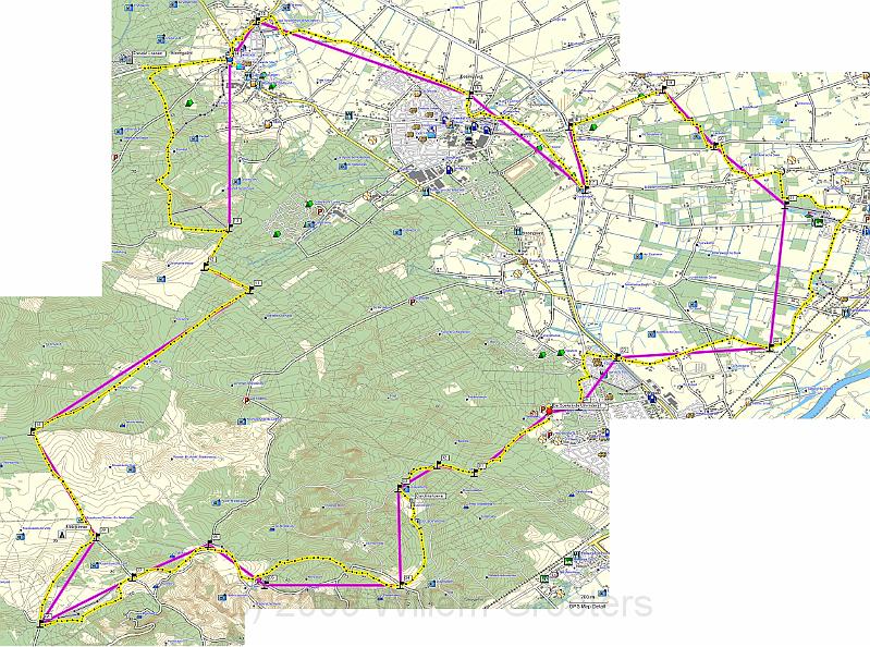 Mapsource.jpg - The route in waypoints (connected off-route by the pink lines), in grey what seemed the right way to go, and in yellow the route we took. A few diversions - especially in the NorthEastern part, to visit the war cemetery, commemorating the civilians that died in concentration camp or prison during the Second Worldwar.