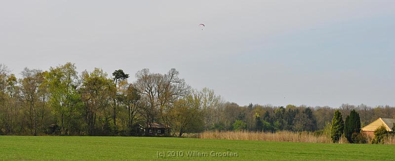 50-GlidingOverWoods.jpg - Looking over the fields, we behold a glider