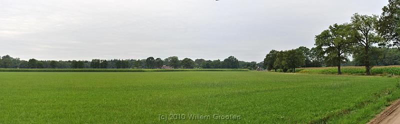 13-Open.jpg - Open lands - all grass, and corn in the distance.